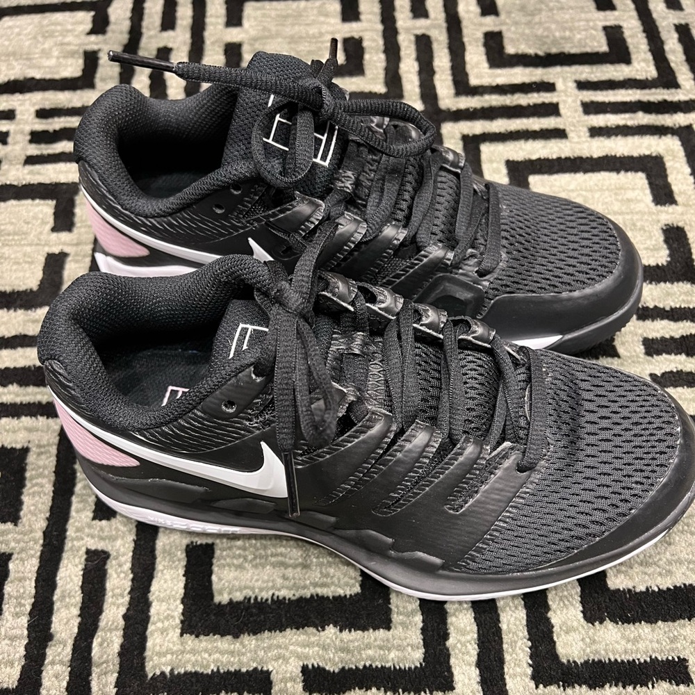 Nike tennis shoes! Sold out color option. Worn once!